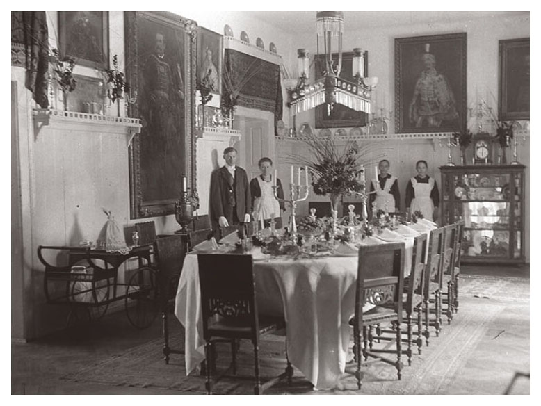 Servants in the dining room of a noble's estate