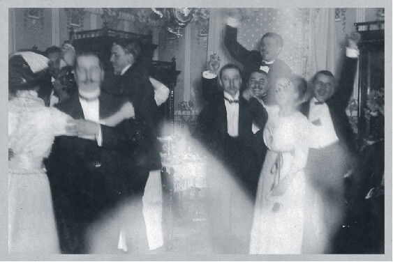 Wealthy Hungarians dancing at a party far away from the fighting