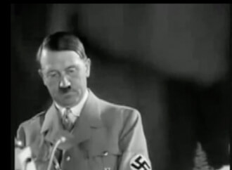 Hitler approaching a lectern