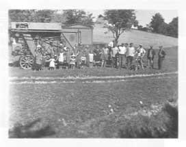 The Fábos family threshing machine in a field in rural Hungary in 1940