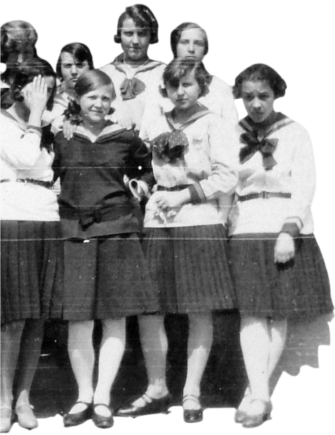 Hungarian Catholic girls in uniform waiting in line to enter their school