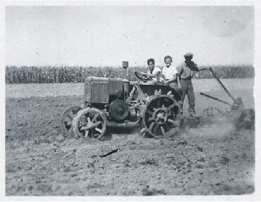 Gyula with cousin Géza on a tractor in Marcali Hungary in 1944