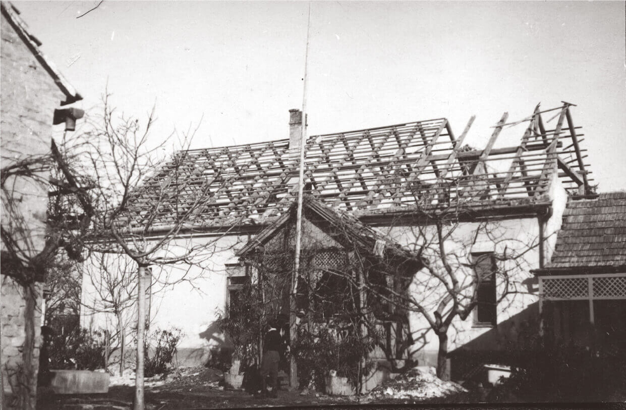 Repairing the bombed roof of the Fábos house in Marcali, 1945