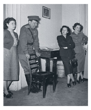 Hungarian gathering with communist policeman in 1955