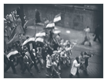First of two Video clips showing peaceful marching on the first day of the 1956 Hungarian revolution