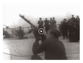 Looped video footage showing Hungarian Freedom Fighters shooting at Soviet air forces flying overhead
