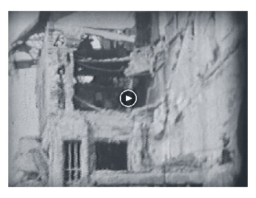 Looped video footage showing Bombed buildings