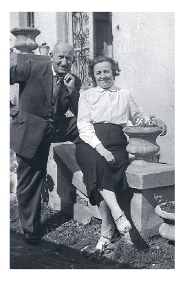 Pista and Gizi sit on a stoop by their house in Keszthely in the 1960s