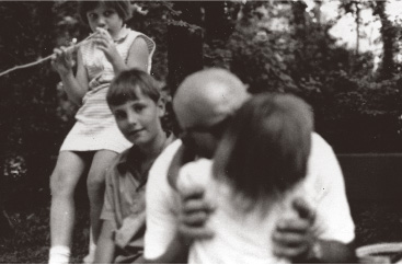 Pista kisses his granddaughter Bettina with Laci and Anita looking on in 1970