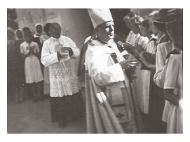 Bishop leading Catholic procession downtown Marcali in Hungary 1940s