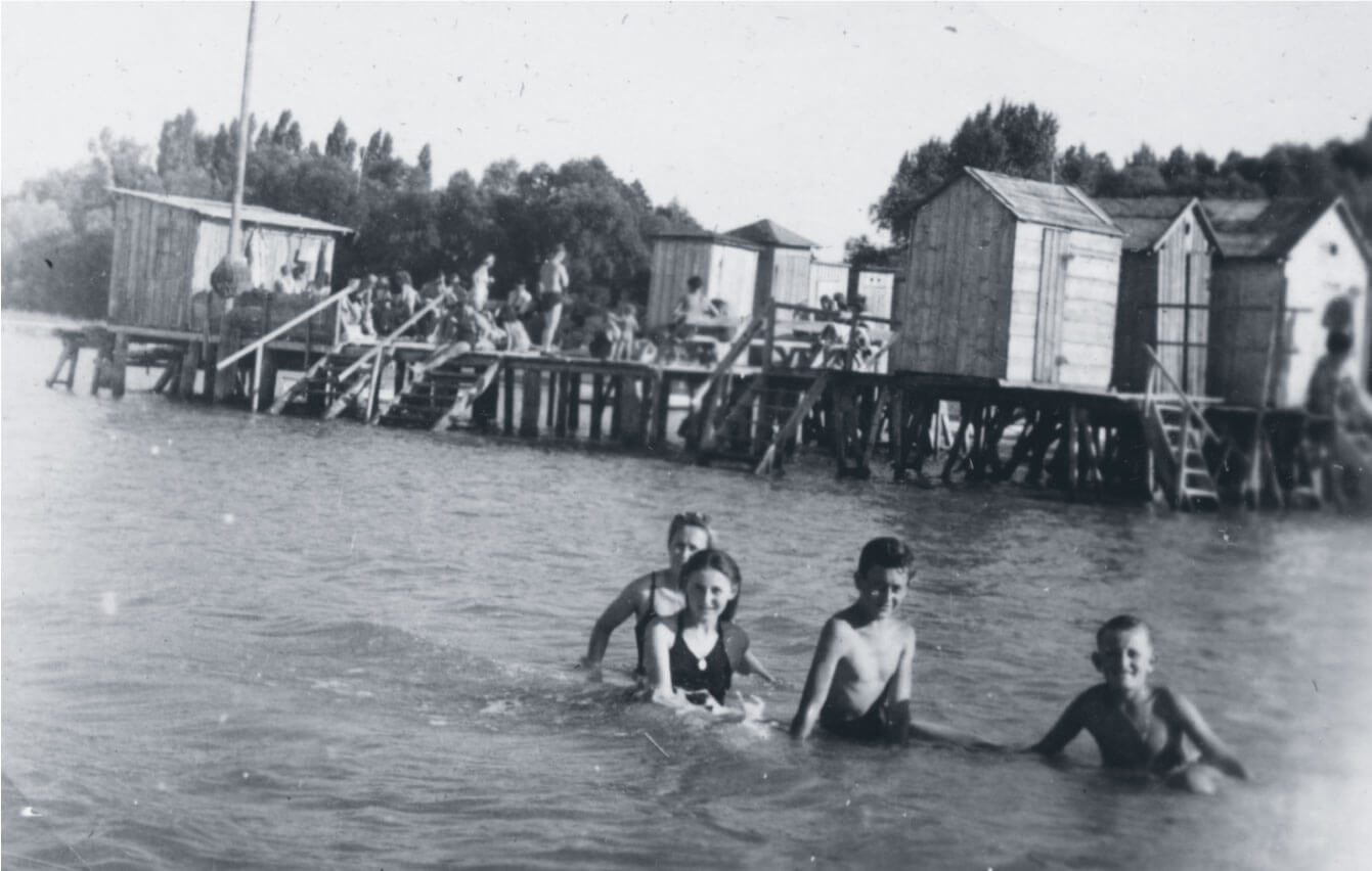 Ari and Gyula swim in Lake Balaton with their cousins during the 1940s
