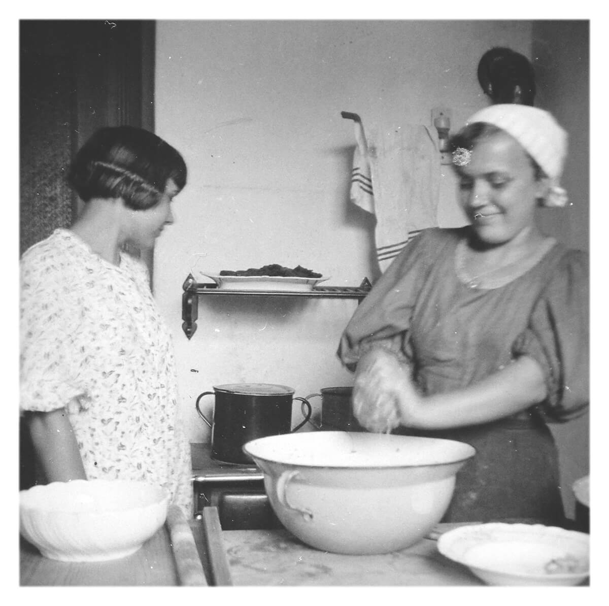 Two Hungarian farming women preparing food