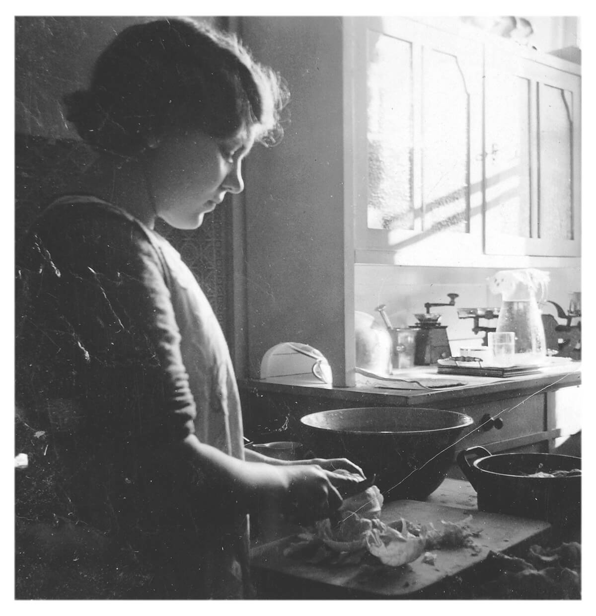 Hungarian farming woman preparing food in a kitchen