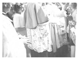 Ari standing in religious procession in Marcali Hungary in 1940