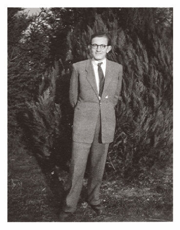 Gyula posing in a suit