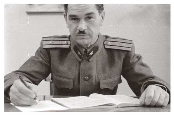 Communist policeman at his desk during Rákosi era