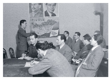 Communist police teaching session with a map
