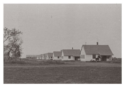 Bleak row of newly built houses on a state or collective farm