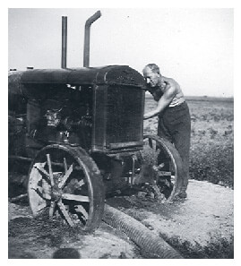 Pista fixing tractor at Bikal State Farm in 1950