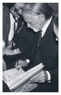 Zoltán Kodály signing autographs